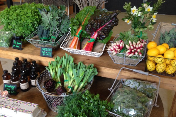 Produce and eggs for sale inside the barn at Flatbed Farm.