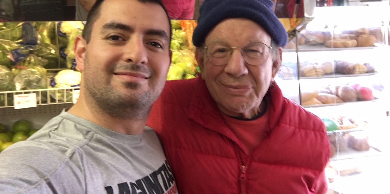 Roberto Iniguez of Tienda Y Panaderia Iniguez with journalist Jonah Raskin